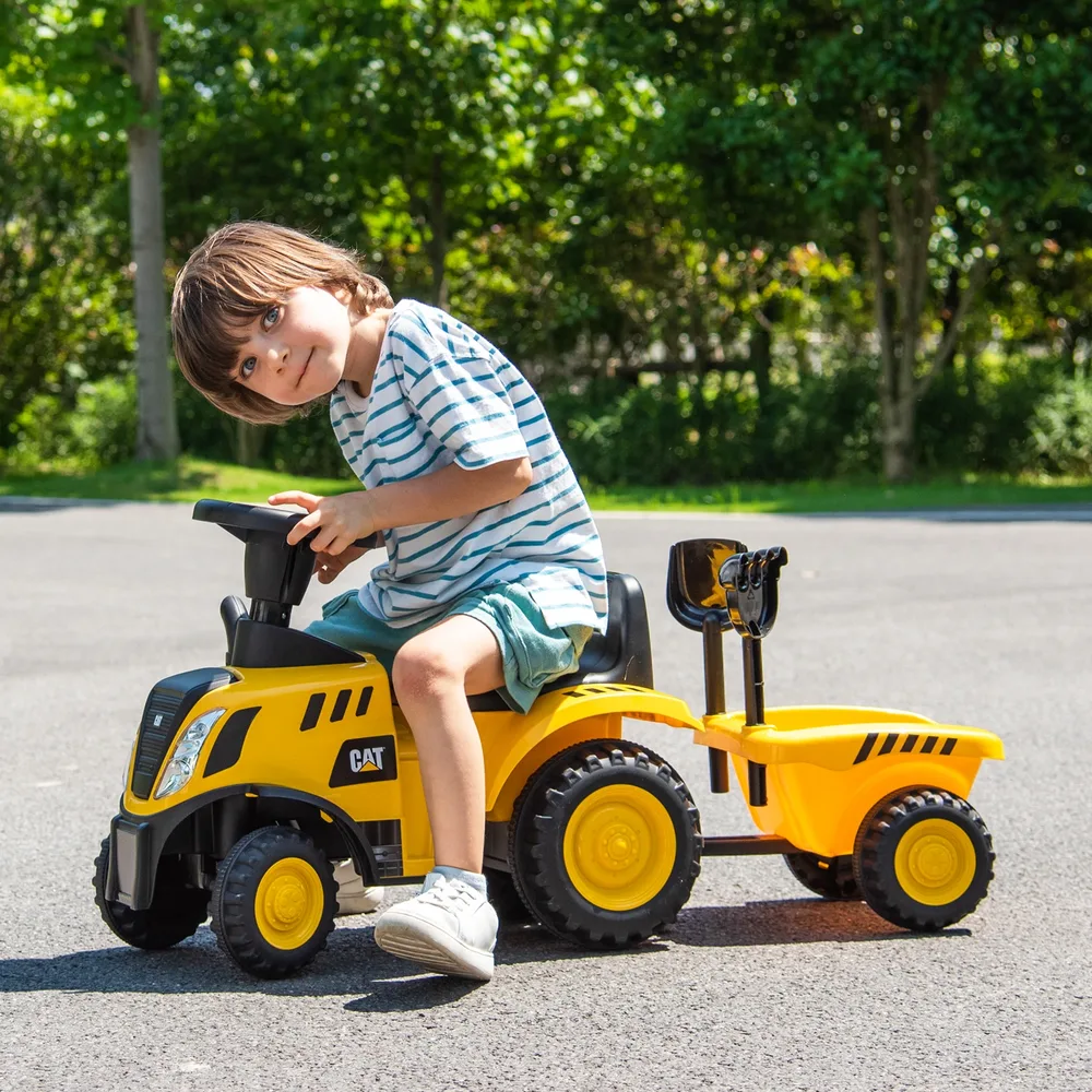 Детски трактор за каране с краката Caterpillar със сваляемо ремарке, жълт, снимка 2